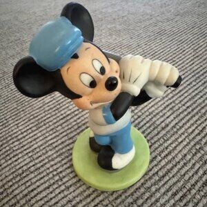 Mickey playing golf figure branded Disney
